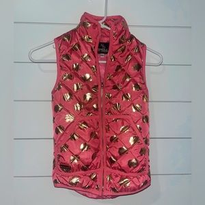 pink vest with gold elephants